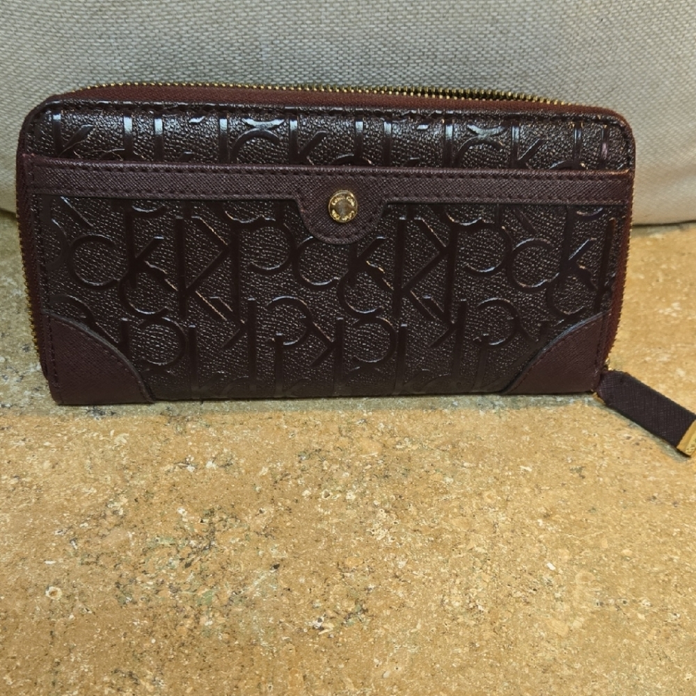 Embossed Maroon Ck Zip Around  Wallet